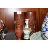 A PAIR OF ORIENTAL CARVED BAMBOO BRUSH POTS TOGETHER WITH A TWIN HANDLED WHITE METAL BASED FAMILLE