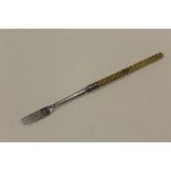 AN ANTIQUE HALLMARKED SILVER PICKLE FORK