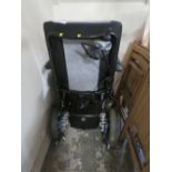 A YOU Q ELECTRIC WHEELCHAIR WITH KEY AND CHARGER