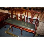 A MODERN CHIPPENDALE STYLE CARVED THREE SEATER BENCH / SOFA - W 164 CM