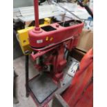 A LARGE RED 'CORONA' PILLAR DRILL