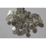 A QUANTITY OF SILVER THREE PENNY COINS