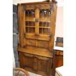 A MELLOWCRAFT QUALITY OAK CARVED AND GLAZED DISPLAY BOOKCASE H-194 CM W-135 CM