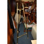 A BRASS EFFECT EASEL, H 153 CM