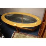 A RETRO OVAL ROCKET STYLE COFFEE TABLE DIA. 96 CM