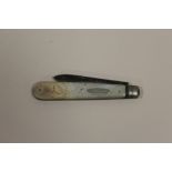 A HALLMARKED SILVER AND MOTHER OF PEARL FRUIT KNIFE