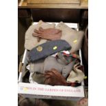 A TRAY OF MILITARY UNIFORM ITEMS TO INCLUDE AN RAF CAP, GLOVES ETC
