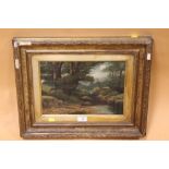 A GILT FRAMED ANTIQUE OIL ON CANVAS DEPICTING A WOODLAND BROOK SCENE,SIGNED LOWER RIGHT