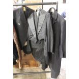 A MILITARY COAT, TWO VINTAGE THREE PIECE SUITS (3)
