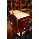 A MAHOGANY DROP LEAF DINING TABLE AND FOUR CHAIRS