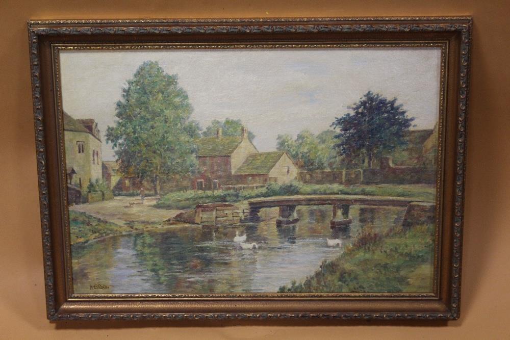 A GILT FRAMED OIL ON BOARD ENTITLED 'LOWER SLAUGHTER - GLOUCESTERSHIRE' BY H E FORSTER