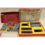 A BOXED TRI-ANG RAILWAYS R2X PASSENGER TRAIN SET, TOGETHER WITH A BOXED STATION SET (2)