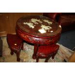 AN ORIENTAL RED LACQUERED NEST OF FIVE TABLES, DIA. 78 CM