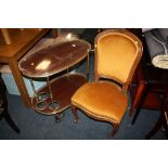 A VINTAGE SERVING/DRINKS TROLLEY TOGETHER WITH AN UPHOLSTERED BEDROOM CHAIR (2)