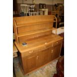 A LIGHT OAK ERCOL STYLE SIDEBOARD A/F, W 121 CM