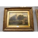 AN ANTIQUE GILT FRAMED OIL ON CANVAS OF A CHURCH AND HOUSE SCENE SIGNED LOWER RIGHT