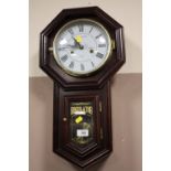 A MODERN REGULATOR WOOD & SONS WALL CLOCK