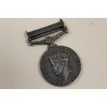 A WHITE METAL PALESTINE MEDAL