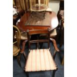 A REPRODUCTION MAHOGANY DINING TABLE AND FOUR CHAIRS