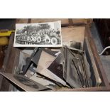 A VINTAGE WOODEN LIDDED BOX CONTAINING BLACK AND WHITE PHOTOGRAPHS POSTCARDS ETC.