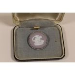 A WEDGWOOD JASPERWARE BROOCH WITH SILVER MOUNT