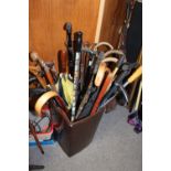 A LARGE QUANTITY OF ASSORTED WALKING STICKS ETC.