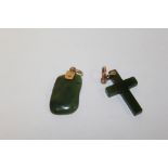 TWO 9 CARAT ROSE GOLD MOUNTED JADE PENDANTS TO INCLUDE A CROSS