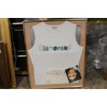 A FRAMED AND GLAZED VEST TOP WORN BY SURANNE JONES FROM CORONATION STREET (KAREN MCDONALD) WITH
