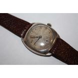 A VINTAGE SILVER CASED GENTS WRISTWATCH