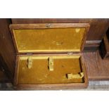 A VINTAGE WOODEN PISTOL CASE