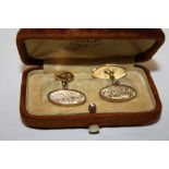 A PAIR OF BOXED 9CT GOLD CUFFLINKS