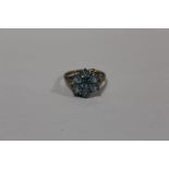 A 9 CARAT GOLD BLUE TOPAZ SET DRESS RING SIZE P APPROX WEIGHT - 2.5G