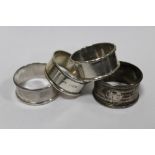 FIVE SILVER NAPKIN RINGS TO INCLUDE A CHARLES HORNER EXAMPLE