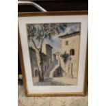 A FRAMED AND GLAZED WATERCOLOUR OF A CONTINENTAL STREET SCENE INDISTINCTLY SIGNED LOWER RIGHT