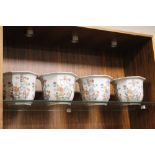 A SET OF FOUR ORIENTAL STYLE CERAMIC JARDINAIRES