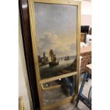 A 19TH CENTURY OIL ON CANVAS OF A FRENCH ESTUARY HARBOUR SCENE WITH MIRROR PANEL BELOW IN GILT