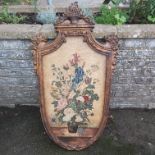 A LARGE HAND-PAINTED LEATHER PANEL DEPICTING A VASE OF FLOWERS AND BUGS, SET IN A LATER FRAME