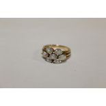 A HALLMARKED 9 CARAT GOLD SEVEN STONE DRESS RING SIZE N APPROX WEIGHT - 3.9G