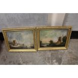 A PAIR OF GILT FRAMED VINTAGE OILS ON BOARD DEPICTING RIVER SCENES