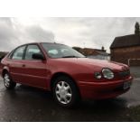 A 1999 RED TOYOTA COROLLA GS 1.6 PETROL - S470 WOA - KEYS AND LOG BOOK, APPROX 33500 MILES, MOT