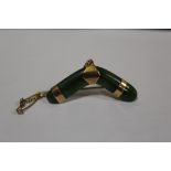 A 9CT ROSE GOLD MOUNTED JADE BROOCH IN THE FORM OF A BOOMERANG