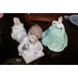 A NAO FIGURE OF A BOY READING A BOOK, TOGETHER WITH A COALPORT LADY FIGURE