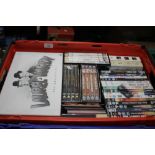 A TRAY OF DVDS (TRAY NOT INCLUDED)
