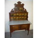 AN ANTIQUE EDWARDIAN STYLE WASH STAND WITH TILED BACK