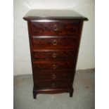 A STAG MINSTREL SIX DRAWER NARROW CHEST OF DRAWERS