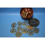 A PAPIER MACHE ORIENTAL SET TOGETHER WITH A CLOCK BACK, HORSE BRASSES ETC.