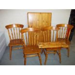 A PINE KITCHEN DINING TABLE AND FOUR CHAIRS