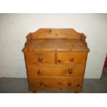 AN ANTIQUE SOLID PINE WASH STAND CHEST