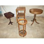 FOUR ITEMS INCLUDING AN ANTIQUE UMBRELLA STAND, A DRUM TABLE AND A SEWING TABLE / TROLLEY