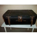A LEATHER BOUND STORAGE / TRAVEL TRUNK BY R. CLAMP & SON